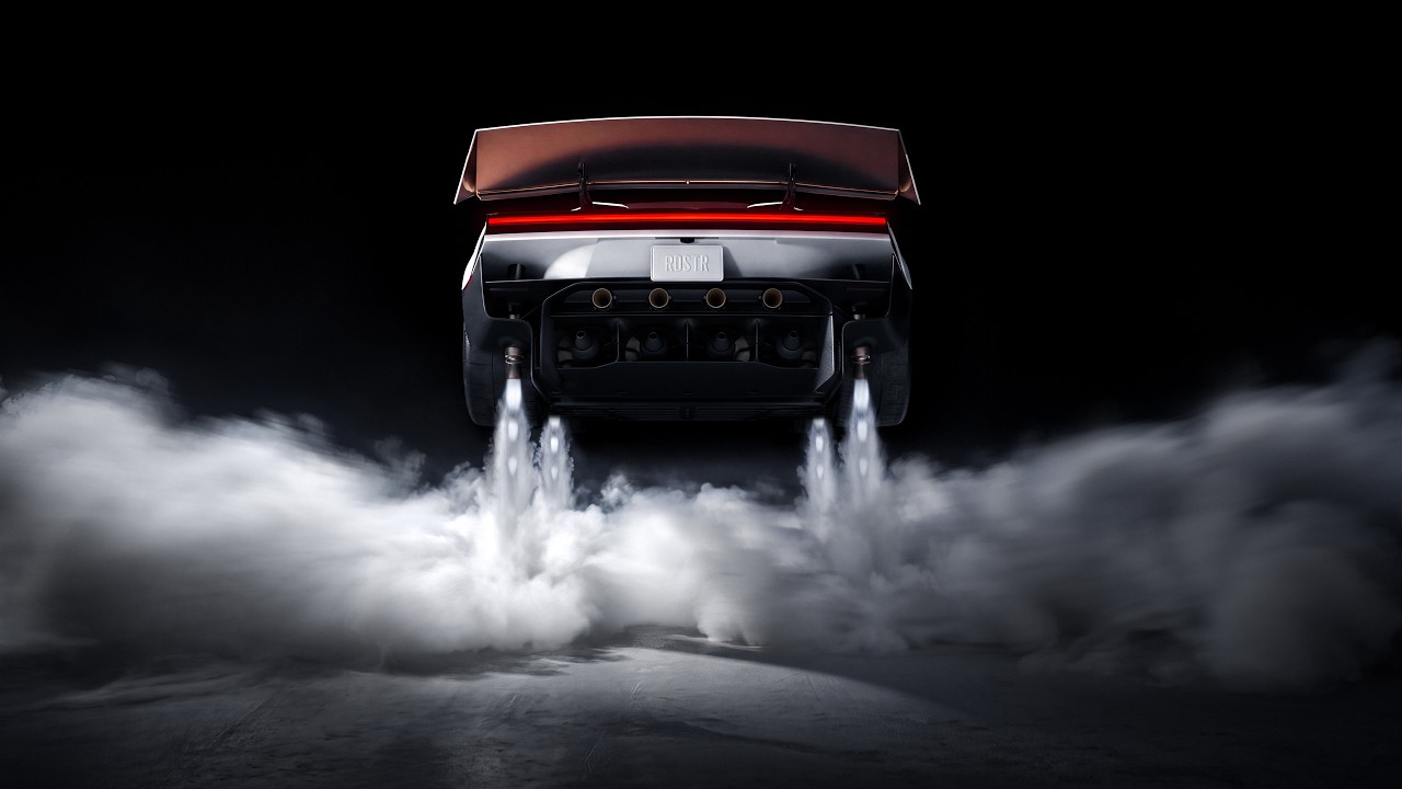 tesla-roadster-cold-gas-thrusters-hero Rear view of the redesigned Tesla Roadster with its active wing deployed, four underbody suction fans, and cold-gas thrusters firing white plumes