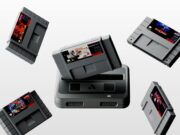 Black Analogue Super Nt+ FPGA console with Chrono Trigger and four Super Nintendo cartridges floating above the cartridge slot