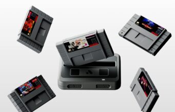 Black Analogue Super Nt+ FPGA console with Chrono Trigger and four Super Nintendo cartridges floating above the cartridge slot