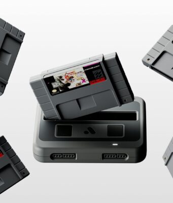 Black Analogue Super Nt+ FPGA console with Chrono Trigger and four Super Nintendo cartridges floating above the cartridge slot