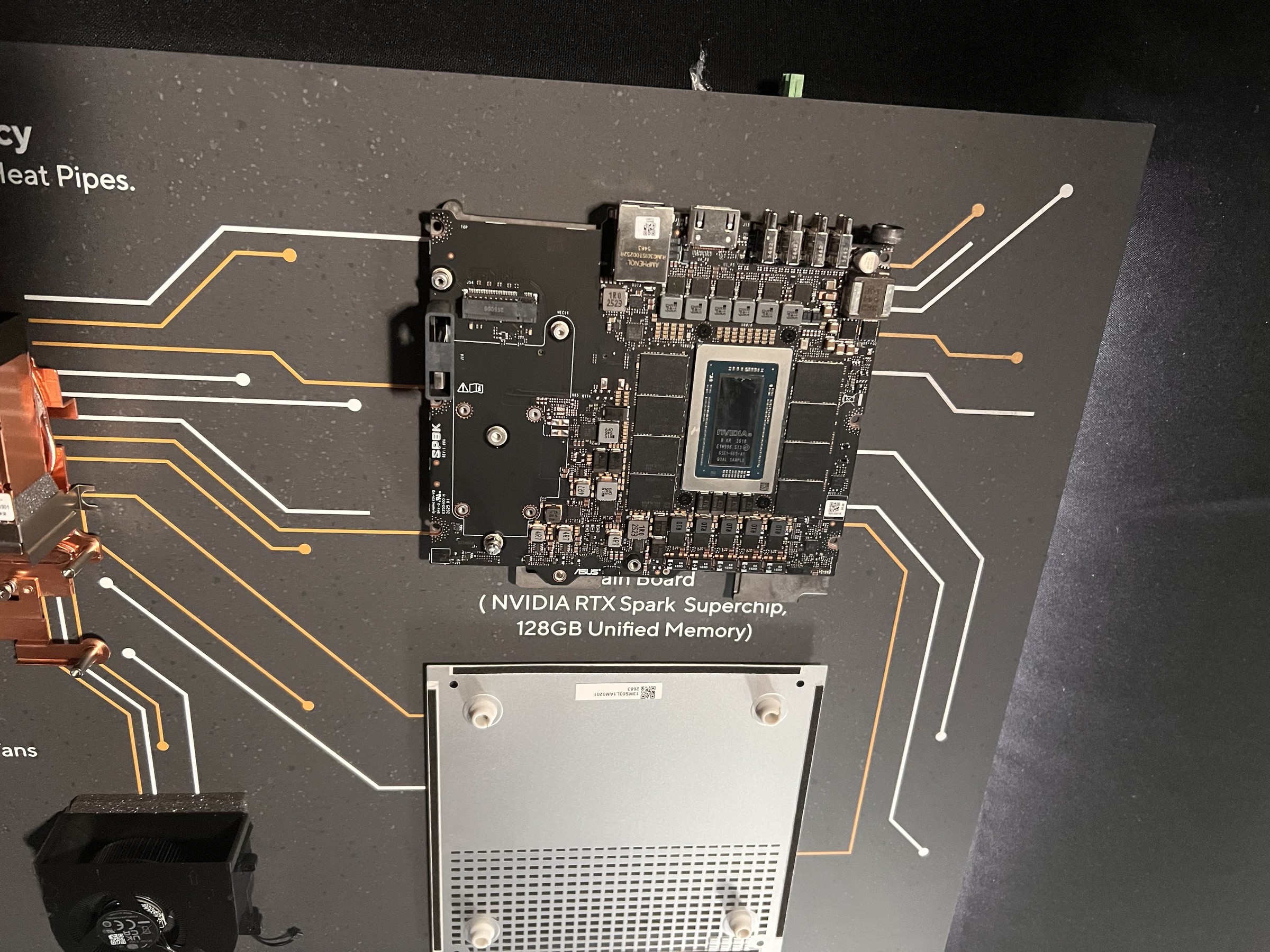 Circuit board and vented metal base on a component display at the ASUS ProArt event