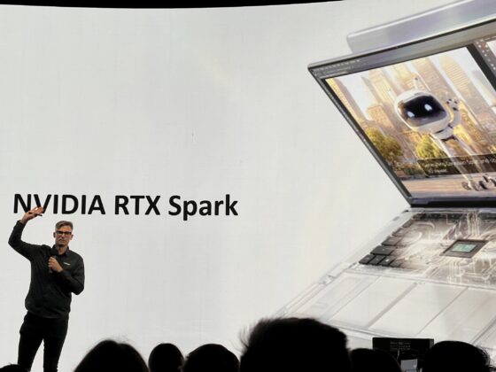 Presenter stands in front of a screen showing an NVIDIA RTX Spark presentation
