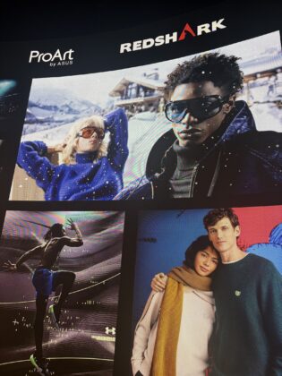Colorful creative imagery covers the event display wall with ProArt and Redshark branding