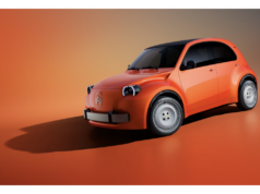 Orange Citroën 2 CV Concept electric concept car shown from the front three-quarter on a studio background
