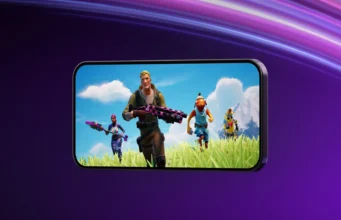 Fortnite Returns to Australia’s App Store After Court Order Official Fortnite artwork showing four characters on a landscape phone against a purple background