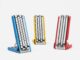 Google Japan’s Gboard Conveyor Belt Keyboard Brings the Keys to You Three conveyor-belt keyboards on stands in blue, yellow and red, each with white keycaps mounted on four vertical belts; the red unit's belts are blurred with the keys in motion