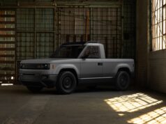Blank Slate Truck two-door electric pickup parked inside a sunlit warehouse