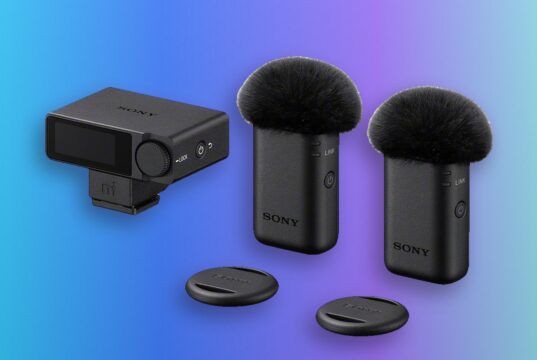 Sony ECM-W5 receiver and two transmitters with windscreens and mounting plates against a blue and violet background