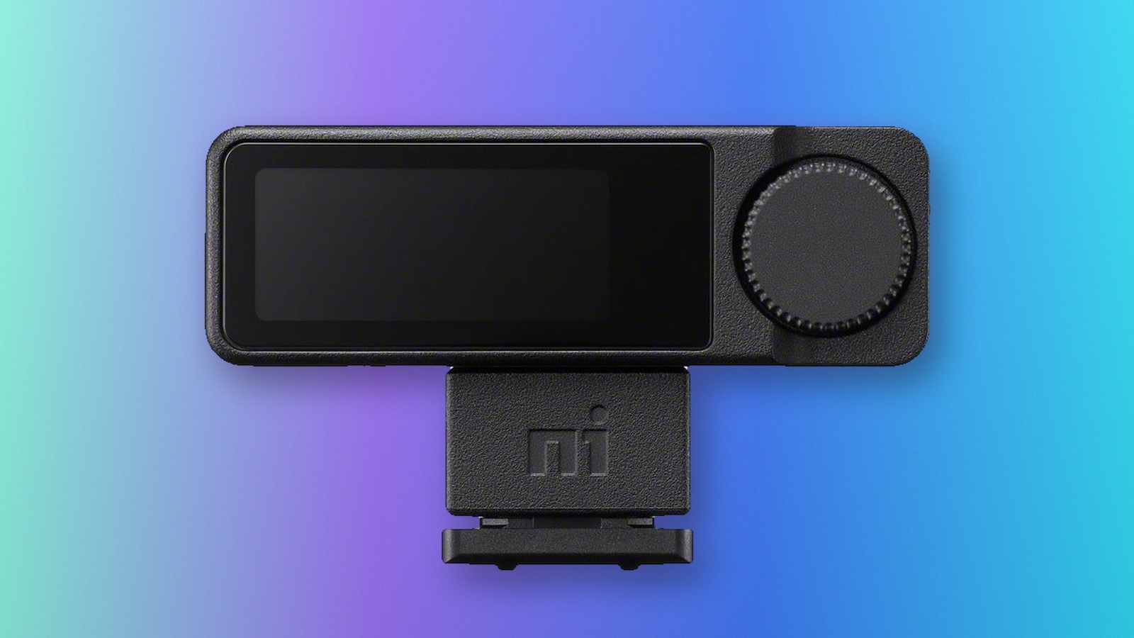 Sony ECM-W5R receiver with screen, control dial and shoe mount against a blue and violet background