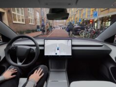 Tesla Assisted Driving interior view from a driver seat on a Dutch city street, from Tesla Netherlands