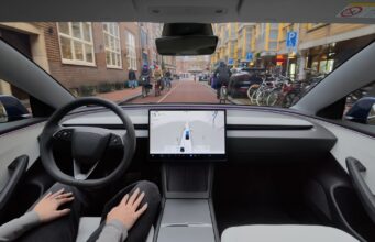 Tesla Assisted Driving Replaces Full Self-Driving In Europe Tesla Assisted Driving interior view from a driver seat on a Dutch city street, from Tesla Netherlands