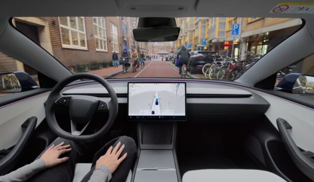 tmm-tesla-assisted-driving-hero Tesla Assisted Driving interior view from a driver seat on a Dutch city street, from Tesla Netherlands