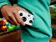 Xbox Nano Controller pre-order opens at $49.99 USD; prices vary A person in a teal hoodie pulls a white Xbox Nano Controller from a front pocket, with a television on in the background